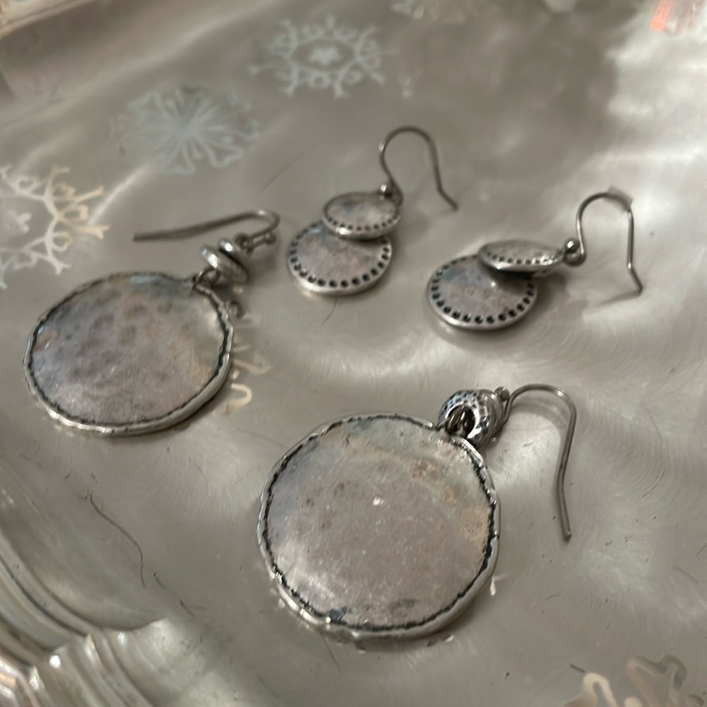 Chico’s 2 sets of hammered silver disc earrings.